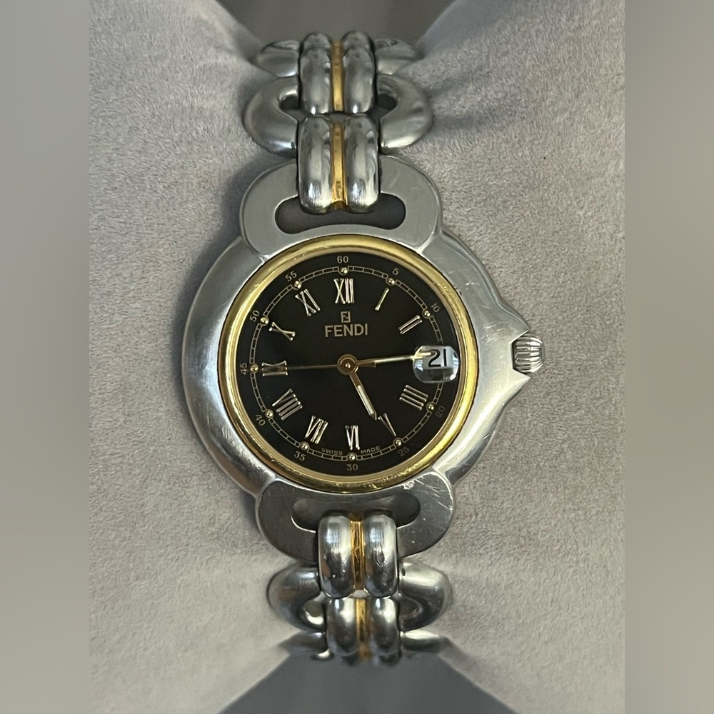 Beautiful and authentic FENDI RIVOLI Collection unisex.